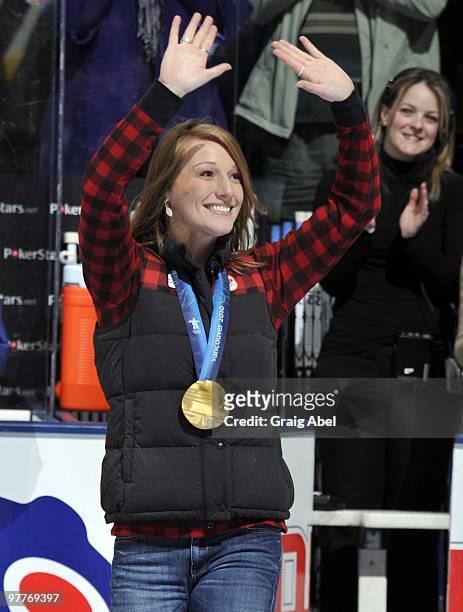Olympian Heather Moyse waves during a pre-game ceremony before game action between the Toronto Maple Leafs and Edmonton Oilers March 13, 2010 at the...