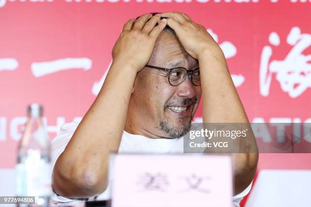 Chinese director Jiang Wen attends a press conference of the jury for the 21st SIFF Golden Goblet Awards during the 21st Shanghai International Film...