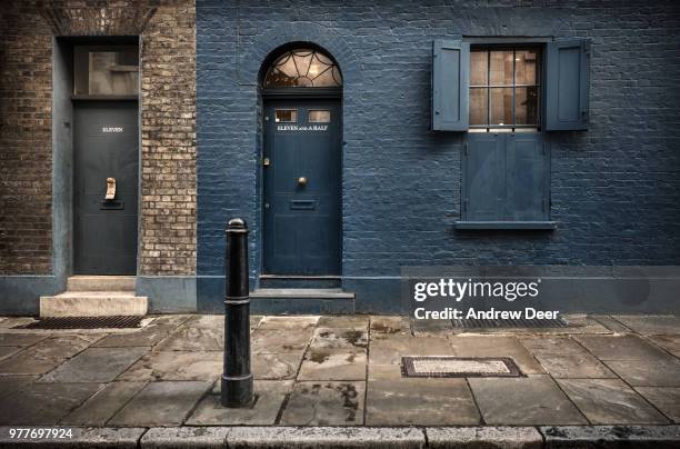 eleven and a ½ - brick house door stock pictures, royalty-free photos & images