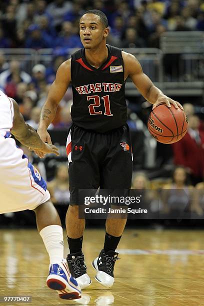 John Roberson of the Texas Tech Red Raiders moves the ball against the Kansas Jayhawks during the quarterfinals of the 2010 Phillips 66 Big 12 Men's...