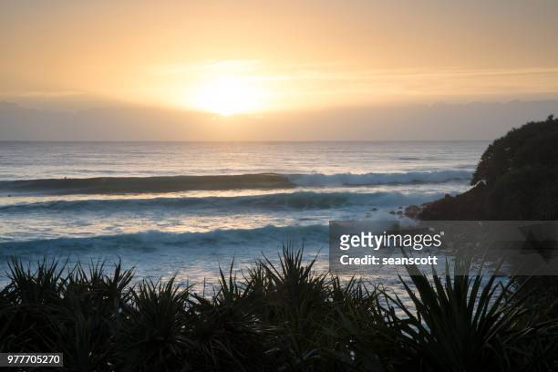 beach sunset, burleigh heads, gold coast, queensland, australia - burleigh beach fotografías e imágenes de stock