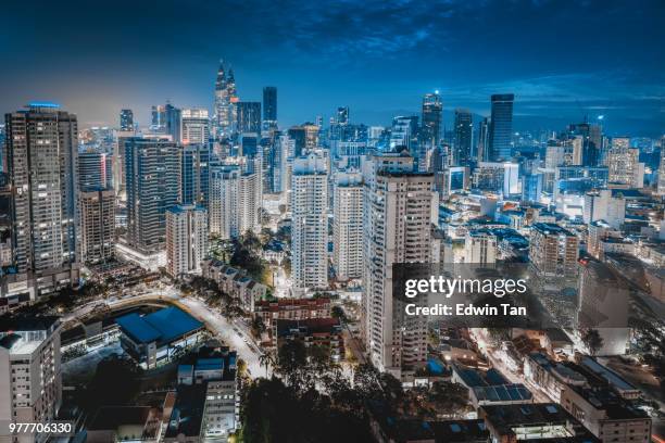 kuala lumpur in dusk hour twin tower from top view - kuala lumpur twin tower stock pictures, royalty-free photos & images