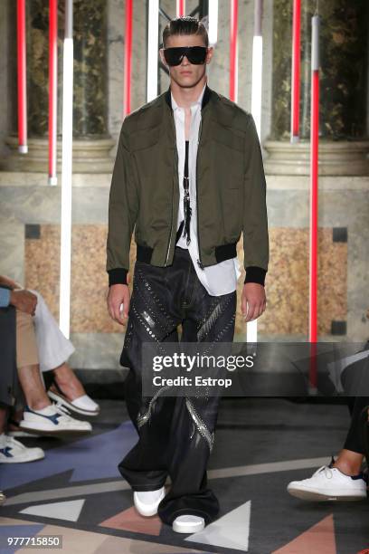 Model walks the runway at the Les Hommes show during Milan Men's Fashion Week Spring/Summer 2019 on June 16, 2018 in Milan, Italy.