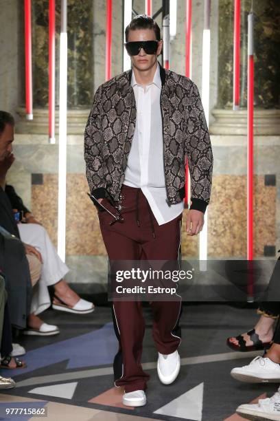 Model walks the runway at the Les Hommes show during Milan Men's Fashion Week Spring/Summer 2019 on June 16, 2018 in Milan, Italy.