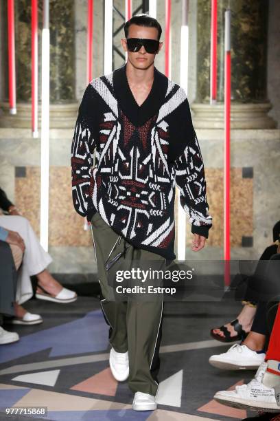 Model walks the runway at the Les Hommes show during Milan Men's Fashion Week Spring/Summer 2019 on June 16, 2018 in Milan, Italy.