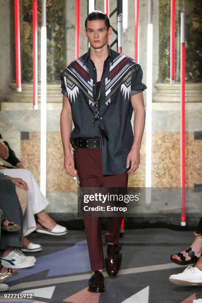 Model walks the runway at the Les Hommes show during Milan Men's Fashion Week Spring/Summer 2019 on June 16, 2018 in Milan, Italy.