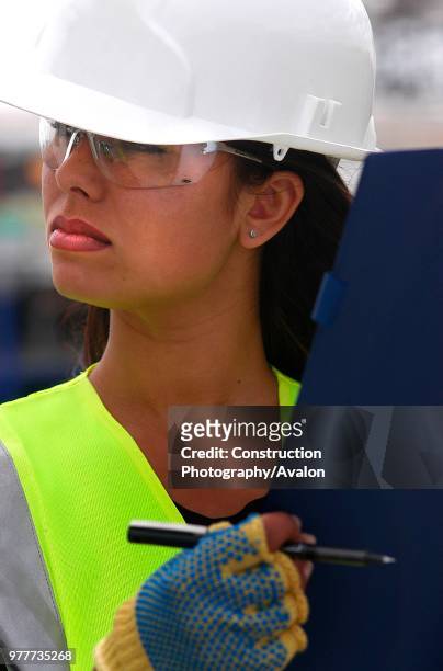 Female Site Worker, Terminal 5, Heathrow Airport Construction, London, UK.
