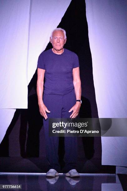 Designer Giorgio Armani acknowledges the applause of the audience at the Giorgio Armani show during Milan Men's Fashion Week Spring/Summer 2019 on...