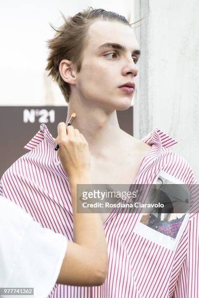 Model Ernest Klimko is seen backstage ahead of the N.21 show during Milan Men's Fashion Week Spring/Summer 2019 on June 18, 2018 in Milan, Italy.
