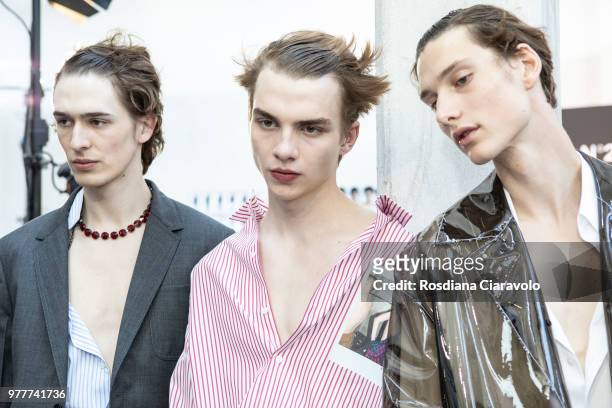 Models and Ernest Klimko are seen backstage ahead of the N.21 show during Milan Men's Fashion Week Spring/Summer 2019 on June 18, 2018 in Milan,...