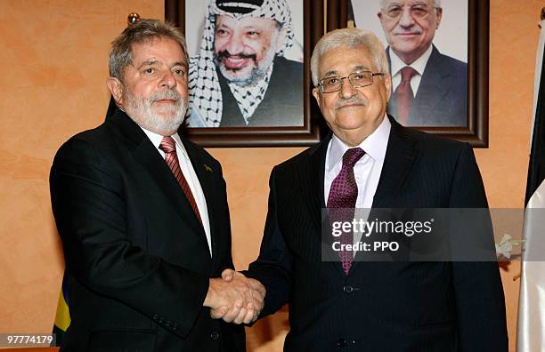 In this handout image supplied by the Palestinian Press Office , Palestinian President Mahmoud Abbas is accompanied by Brazilian President Luiz...