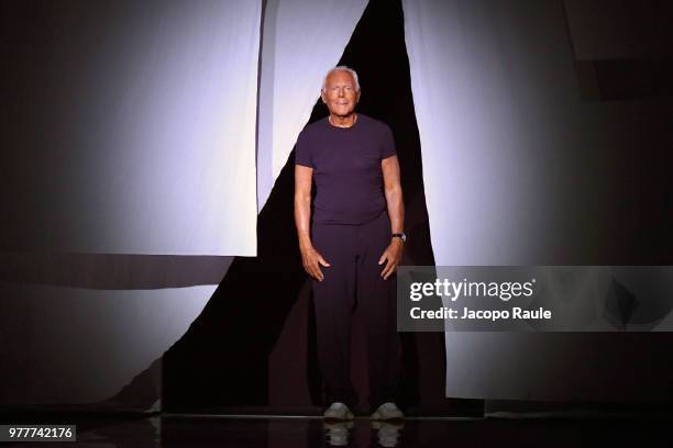 Designer Giorgio Armani acknowledges the applause of the audience at the Giorgio Armani show during Milan Men's Fashion Week Spring/Summer 2019 on...