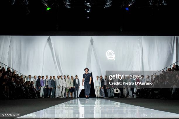 Model walks the runway at the Giorgio Armani show during Milan Men's Fashion Week Spring/Summer 2019 on June 18, 2018 in Milan, Italy.