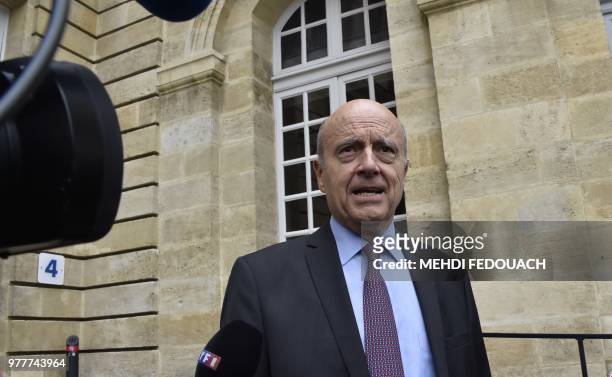 Bordeaux mayor, former French prime minister Alain Juppe speaks to journalists in front of Bordeaux townhall, on June 18, 2018 during a press...