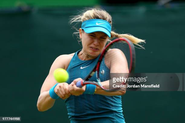 Eugenie Bouchard of Canada plays a backhand during her qualifying match against Jennifer Brady of the USA during day three of the Nature Valley...
