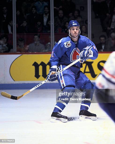 Owen Nolan of the Quebec Nordiques skates against the Montreal Canadiens in the early 1990's at the Montreal Forum in Montreal, Quebec, Canada.