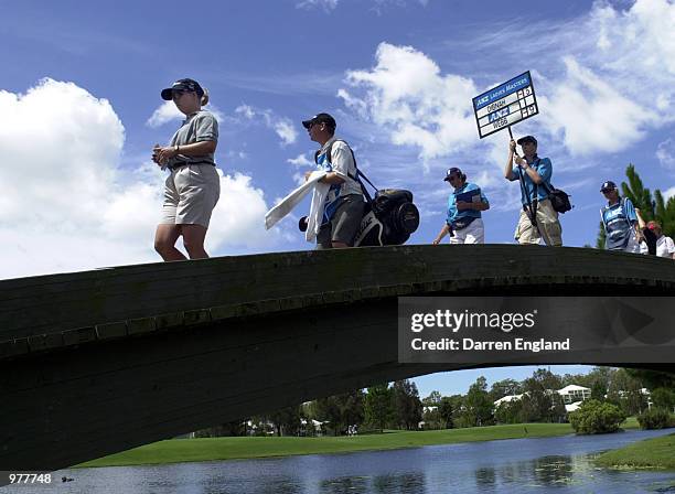 Karrie Webb of Australia crosses a bridge to the 7th green during the third round at the ANZ Australian Ladies Masters Golf at Royal Pines Resort on...