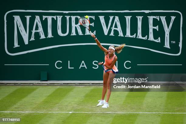 Kristina Mladenovic of France serves during her round of 32 match against Katerina Siniakova of the Czech Republic during day three of the Nature...