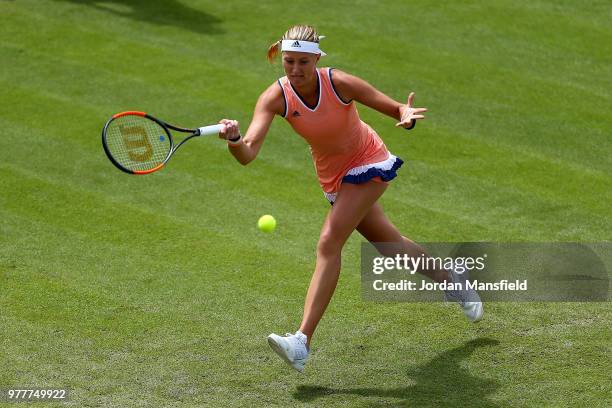 Kristina Mladenovic of France plays a forehand during her round of 32 match against Katerina Siniakova of the Czech Republic during day three of the...