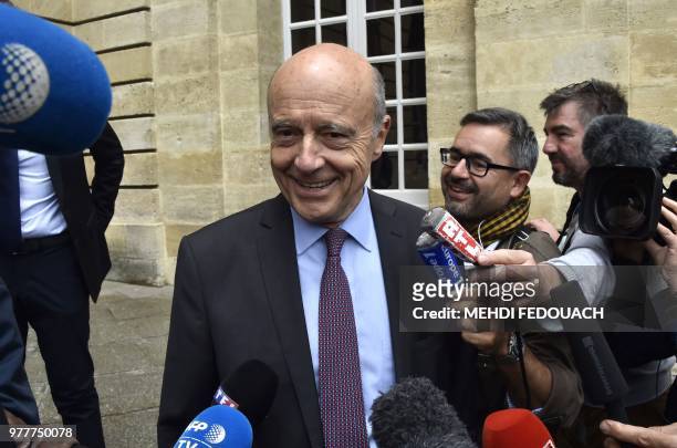 Bordeaux mayor, former French prime minister Alain Juppe speaks to journalists in front of Bordeaux townhall, on June 18, 2018 during a press...