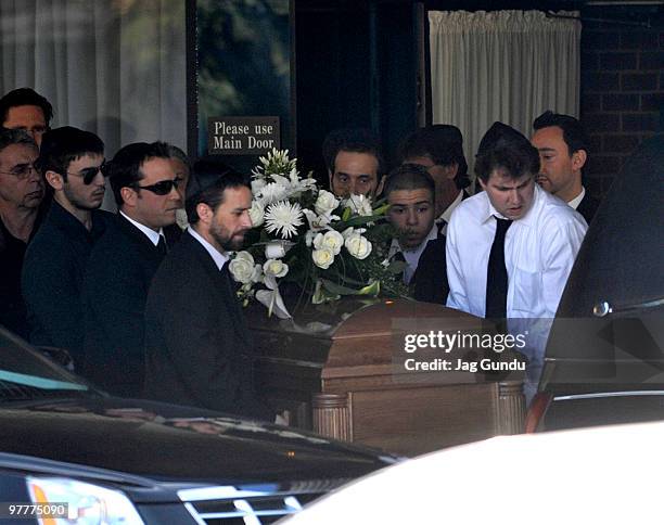 Mourners carry the coffin during the private funeral service for actor Corey Haim at Steeles Memorial Chapel on March 16, 2010 in Thornhill, Ontario,...