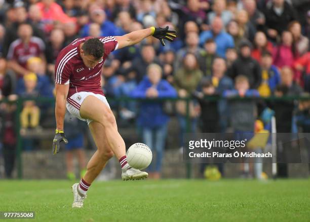 Roscommon , Ireland - 17 June 2018; Damien Comer of Galway scores a late point during the Connacht GAA Football Senior Championship Final match...