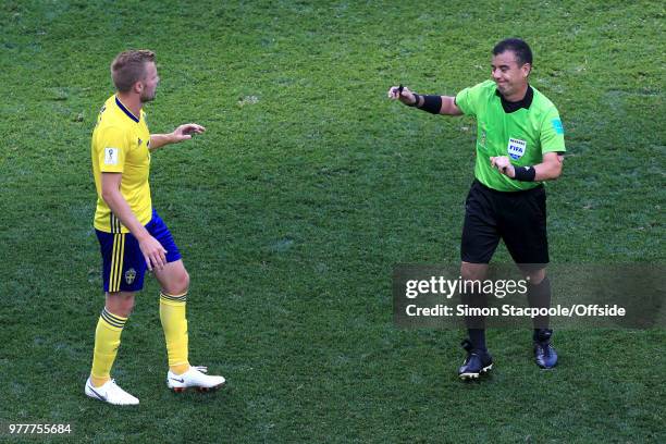 Referee Joel Aguilar has words with Sebastian Larsson of Sweden during the 2018 FIFA World Cup Russia group F match between Sweden and Korea Republic...
