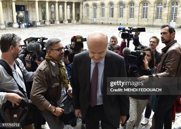 Bordeaux mayor, former French prime minister Alain Juppe leaves after speaking to journalists in front of Bordeaux townhall, on June 18, 2018 during...
