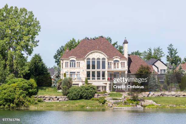 luxury property on sunny day of summer - onfokus stock pictures, royalty-free photos & images