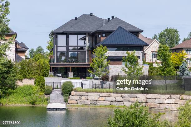 luxury property on sunny day of summer - onfokus stock pictures, royalty-free photos & images