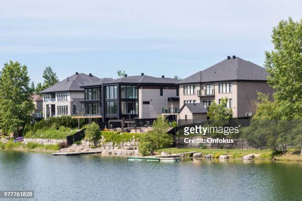 luxury property on sunny day of summer - onfokus stock pictures, royalty-free photos & images