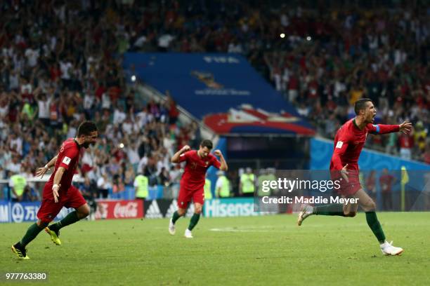 June 15: Cristiano Ronaldo of Portugal celebrates after scoring a goal against the Spain during the 2018 FIFA World Cup Russia group B match between...