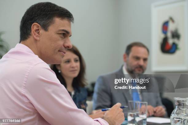 In this handout image provided by Moncloa, Spanish Prime Minister, Pedro Sanchez is seen during a meeting with Deputy Prime Minister, Carmen Calvo...