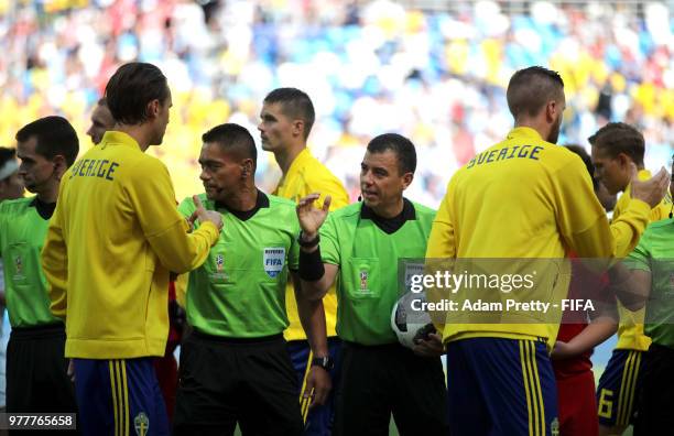 Referee Joel Aguilar sakes the hands with Sweden players during the 2018 FIFA World Cup Russia group F match between Sweden and Korea Republic at...