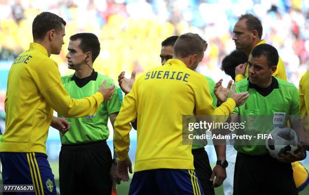Referee Joel Aguilar sakes the hands with Sweden players during the 2018 FIFA World Cup Russia group F match between Sweden and Korea Republic at...