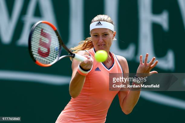 Kristina Mladenovic of France plays a forehand during her round of 32 match against Katerina Siniakova of the Czech Republic during day three of the...
