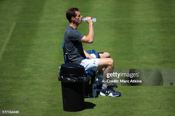 Andy Murray of Great Britain takes a break during a practice session on Day 1 of the Fever-Tree Championships at Queens Club on June 18, 2018 in...