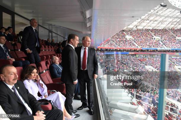 President Vladimir Putin and Prime Minister Dmitry Medvedev attend the opening ceremony prior to the 2018 FIFA World Cup Russia Group A match between...