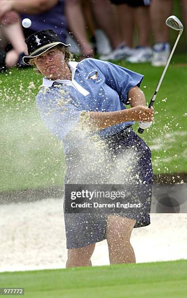 Corinne Dibnah of Australia hits out of a bunker on the 2nd green during the third round at the ANZ Australian Ladies Masters Golf at Royal Pines...