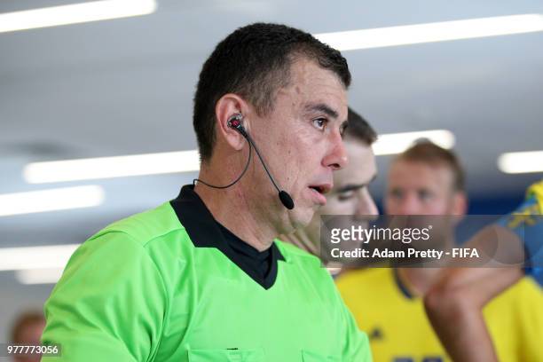 Referee Joel Aguilar looks on from the tunnel at half time during the 2018 FIFA World Cup Russia group F match between Sweden and Korea Republic at...
