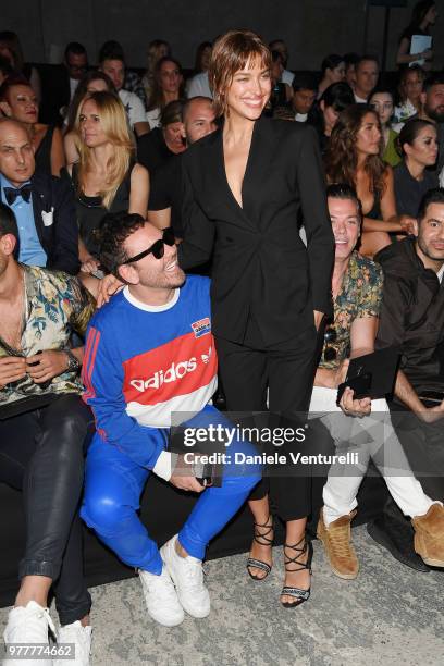 Mert Alas, Irina Shayk and Marcus Piggott attend Dsquared2 show during Milan Men's Fashion Spring/Summer 2019 on June 17, 2018 in Milan, Italy.