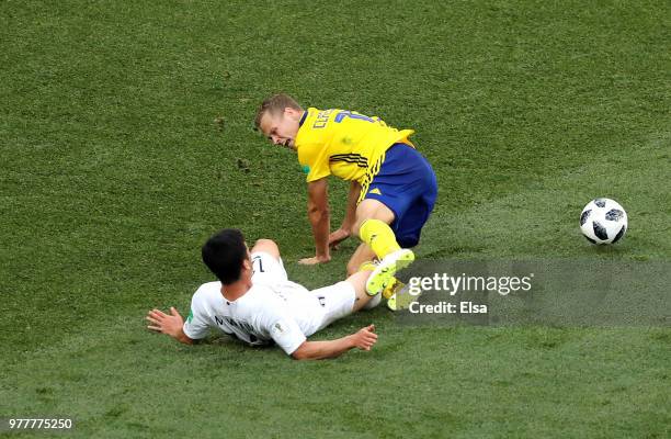 Kim Min-Woo of Korea Republic fouls Viktor Claesson of Sweden inside the box, leading to a VAR decision penalty during the 2018 FIFA World Cup Russia...