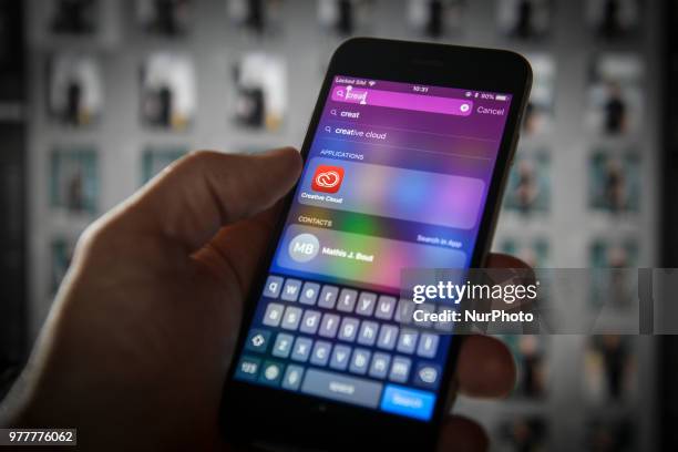 The Adobe Creative Cloud application for storing images is seen on an iPhone in this photo illustration on June 18, 2018 in Warsaw, Poland.