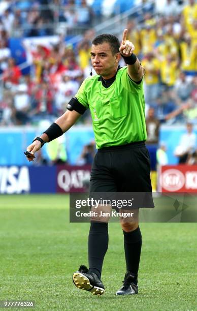 Referee Joel Aguilar gestures during the 2018 FIFA World Cup Russia group F match between Sweden and Korea Republic at Nizhniy Novgorod Stadium on...