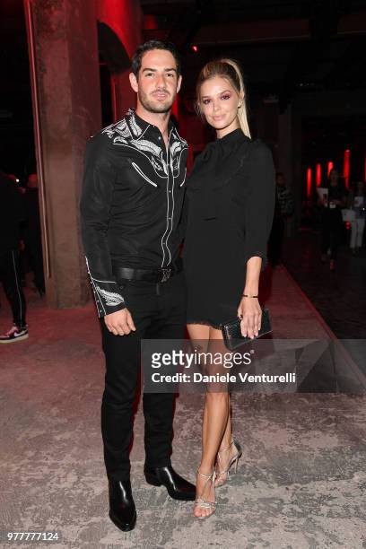 Alexandre Pato and Danielle Knudson attend Dsquared2 show during Milan Men's Fashion Spring/Summer 2019 on June 17, 2018 in Milan, Italy.