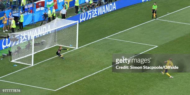 Andreas Granqvist of Sweden beats South Korea goalkeeper Cho Hyun-Woo and scores their 1st goal from the penalty spot during the 2018 FIFA World Cup...