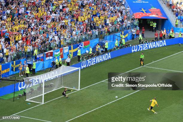 Andreas Granqvist of Sweden beats South Korea goalkeeper Cho Hyun-Woo and scores their 1st goal from the penalty spot during the 2018 FIFA World Cup...