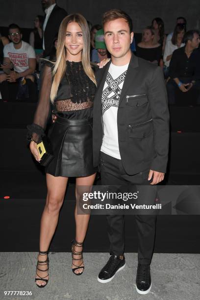 Ann-Kathrin Vida and Mario Gotze attend Dsquared2 show during Milan Men's Fashion Spring/Summer 2019 on June 17, 2018 in Milan, Italy.