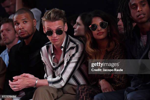 Jamie Campbell Bower and M.I.A. Attend the Fendi show during Milan Men's Fashion Week Spring/Summer 2019 on June 18, 2018 in Milan, Italy.