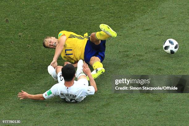 Kim Min-Woo of South Korea fouls Viktor Claesson of Sweden and gives away a penalty during the 2018 FIFA World Cup Russia group F match between...